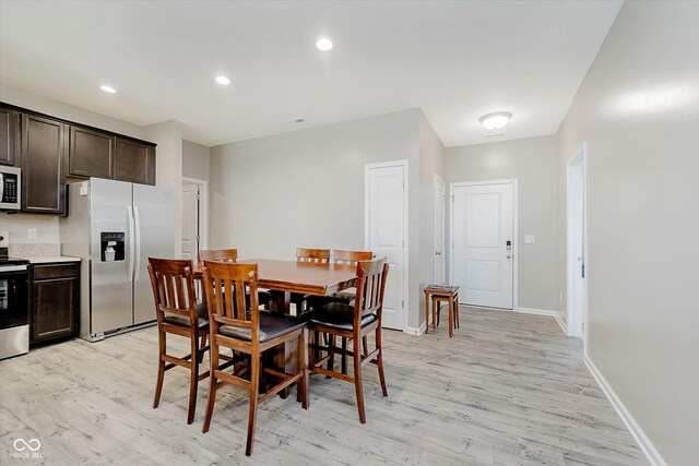 6644 Aberdeen Dr, Mccordsville, IN 46055 - dining area with light wood-style flooring and recessed lighting