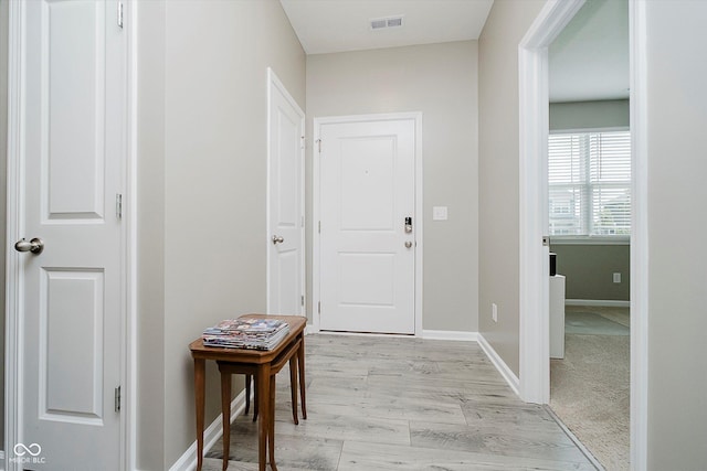 6644 Aberdeen Dr, Mccordsville, IN 46055 - foyer with baseboards and light wood-style flooring