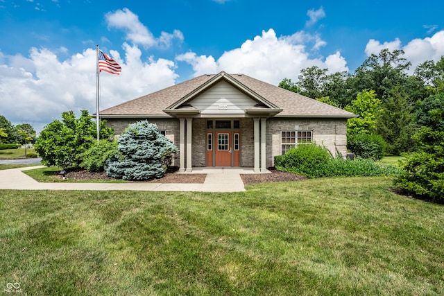 246 Legends Creek Way Apt 207, Indianapolis, IN 46229 - view of front of house with a front lawn and a shingled roof