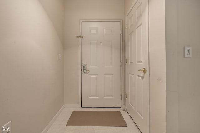 246 Legends Creek Way Apt 207, Indianapolis, IN 46229 - entryway featuring baseboards and light tile patterned floors