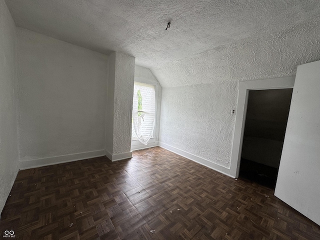 401 S W St, Kempton, IN 46049 - bonus room with vaulted ceiling, a textured ceiling, and a textured wall