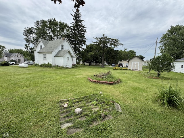 401 S W St, Kempton, IN 46049 - view of green lawn featuring an outdoor structure