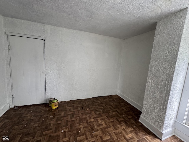 401 S W St, Kempton, IN 46049 - spare room featuring a textured wall and a textured ceiling