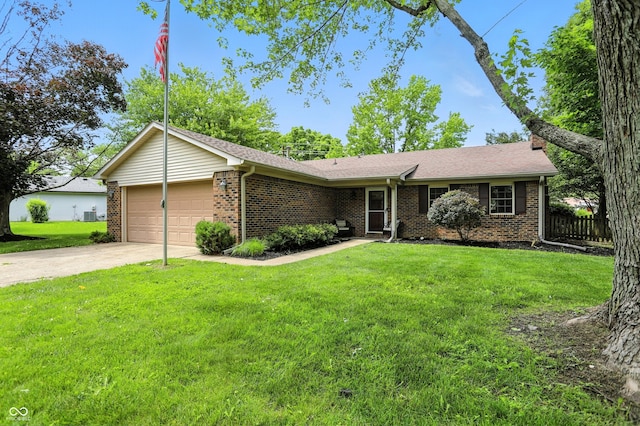610 Front Royal Dr, Indianapolis, IN 46227 - ranch-style house featuring a garage, brick siding, and concrete driveway