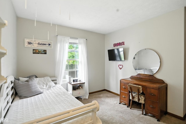 610 Front Royal Dr, Indianapolis, IN 46227 - bedroom with light carpet and baseboards