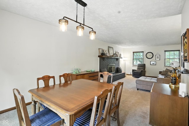 610 Front Royal Dr, Indianapolis, IN 46227 - dining area with light carpet, a brick fireplace, and a textured ceiling