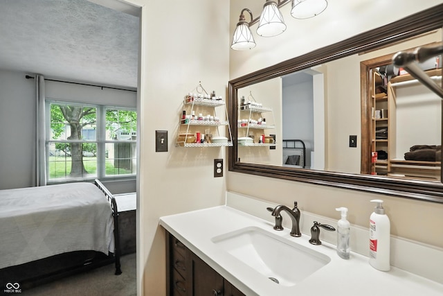 610 Front Royal Dr, Indianapolis, IN 46227 - ensuite bathroom with vanity and a textured ceiling