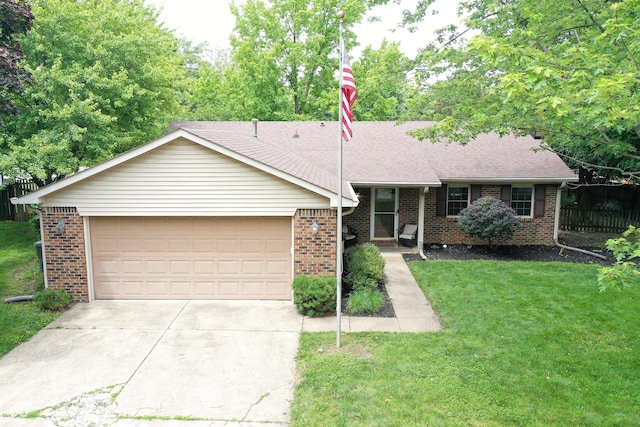 610 Front Royal Dr, Indianapolis, IN 46227 - view of front facade with concrete driveway, brick siding, a garage, and a shingled roof