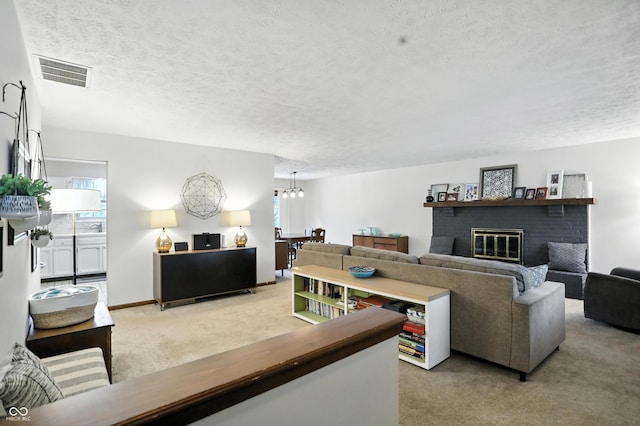 610 Front Royal Dr, Indianapolis, IN 46227 - carpeted living room featuring a textured ceiling and a brick fireplace