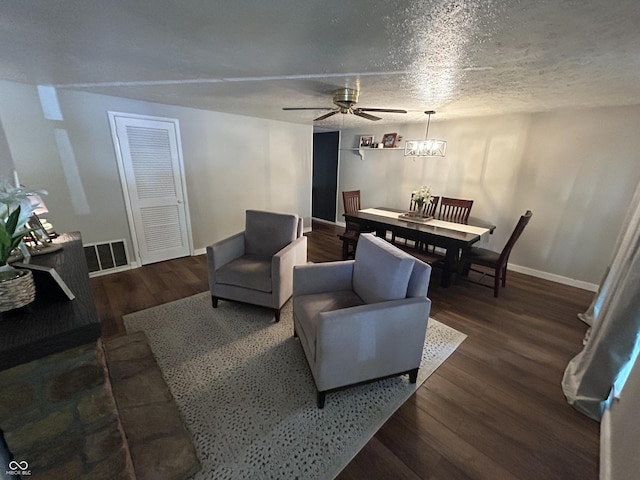 1908 Tennyson Dr, Clarksville, IN 47129 - living room featuring ceiling fan, wood finished floors, a chandelier, and a textured ceiling