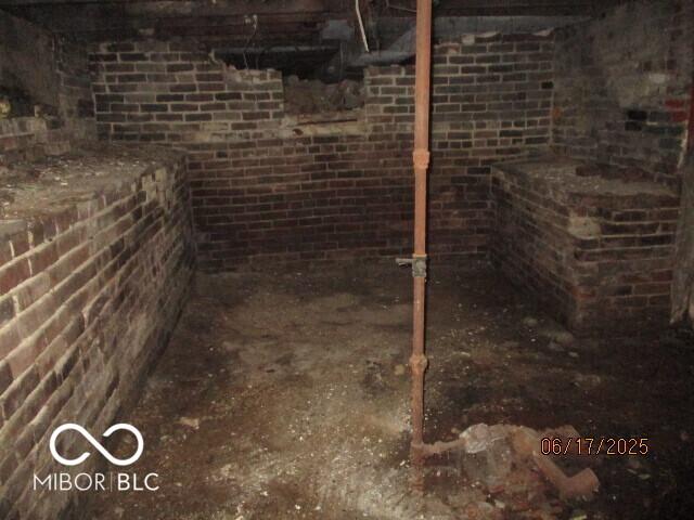 1601 Spann Ave, Indianapolis, IN 46203 - finished below grade area with brick wall