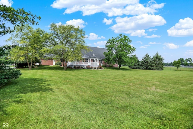 11250 N 600 W, Fountaintown, IN 46130 - view of grassy yard featuring covered porch