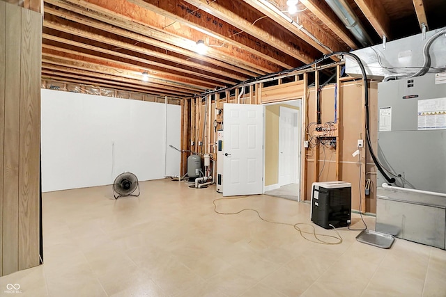 11250 N 600 W, Fountaintown, IN 46130 - unfinished basement featuring a water pressure tank