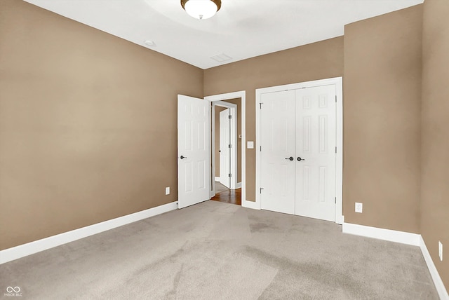 11250 N 600 W, Fountaintown, IN 46130 - unfurnished bedroom featuring carpet flooring and a closet