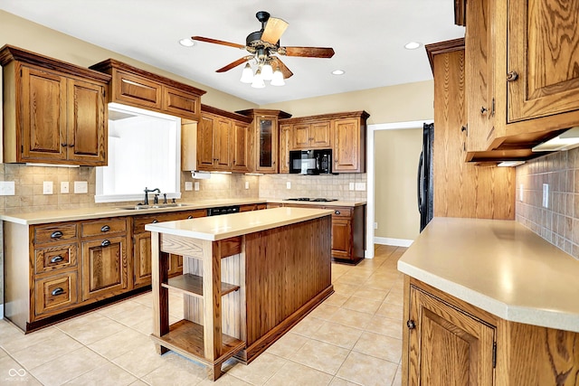 11250 N 600 W, Fountaintown, IN 46130 - kitchen with black microwave, decorative backsplash, ceiling fan, brown cabinetry, and recessed lighting