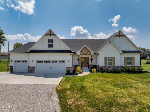 320 Briar Hill Dr, Whiteland, IN 46184 - view of front of property featuring french doors, board and batten siding, driveway, and a front lawn
