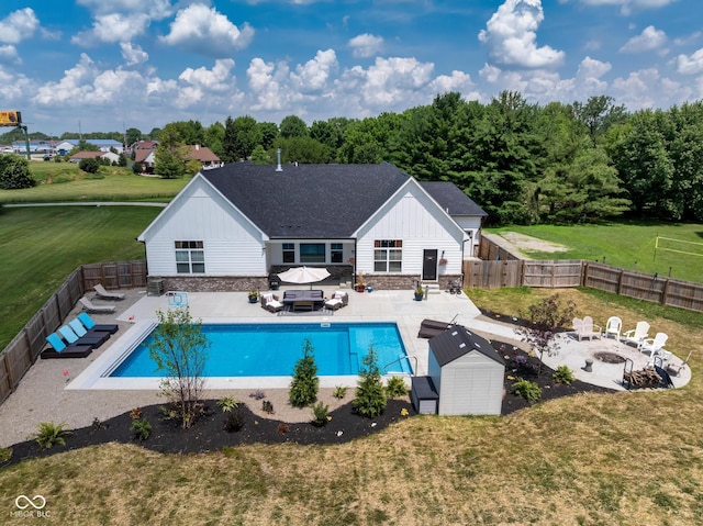 320 Briar Hill Dr, Whiteland, IN 46184 - view of swimming pool featuring a fenced backyard, a patio area, and an outdoor living space with a fire pit
