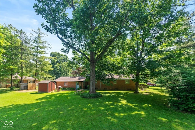 2808 Woodside Dr, Plainfield, IN 46168 - view of grassy yard with a storage shed