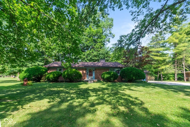 2808 Woodside Dr, Plainfield, IN 46168 - ranch-style house featuring a front yard and brick siding