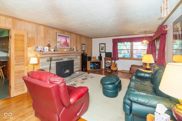 2808 Woodside Dr, Plainfield, IN 46168 - living area with wood finished floors, wooden walls, and a textured ceiling
