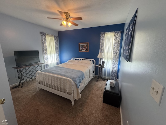 1626 N Nieman Dr, Greensburg, IN 47240 - carpeted bedroom with baseboards and a ceiling fan