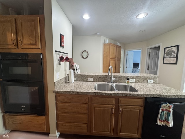 1626 N Nieman Dr, Greensburg, IN 47240 - kitchen with black appliances, brown cabinetry, light stone countertops, recessed lighting, and a textured ceiling