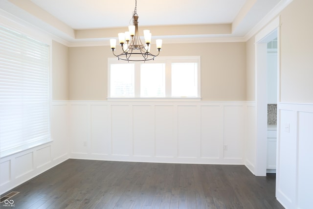 13044 Moorland Ln, Carmel, IN 46074 - unfurnished dining area with a decorative wall, a chandelier, a wainscoted wall, dark wood-style floors, and a tray ceiling