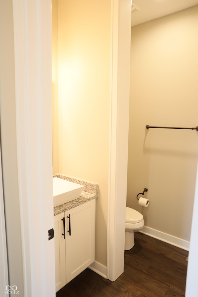 13044 Moorland Ln, Carmel, IN 46074 - half bath with vanity and wood finished floors