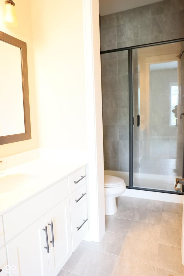 13044 Moorland Ln, Carmel, IN 46074 - full bath featuring vanity, a shower stall, and tile patterned floors