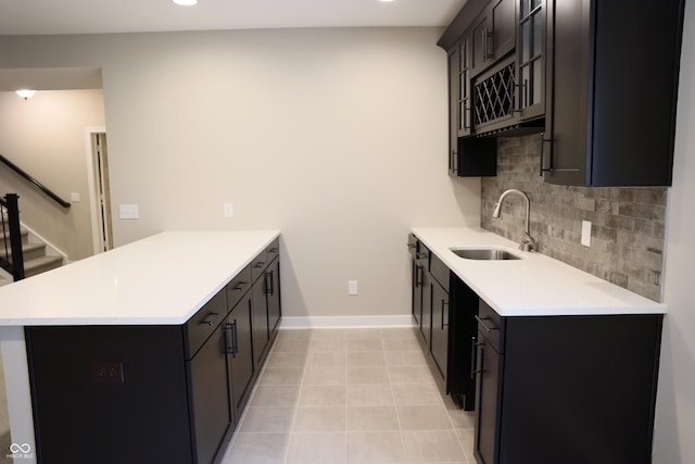 13044 Moorland Ln, Carmel, IN 46074 - kitchen with a peninsula, tasteful backsplash, light countertops, and recessed lighting