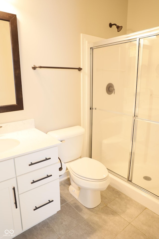 13044 Moorland Ln, Carmel, IN 46074 - full bathroom with vanity, a stall shower, and tile patterned floors