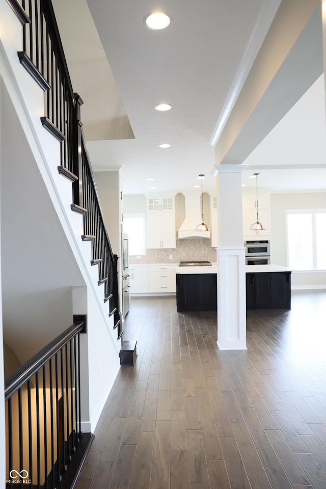 13044 Moorland Ln, Carmel, IN 46074 - interior space with dark wood-style floors, recessed lighting, and stairway
