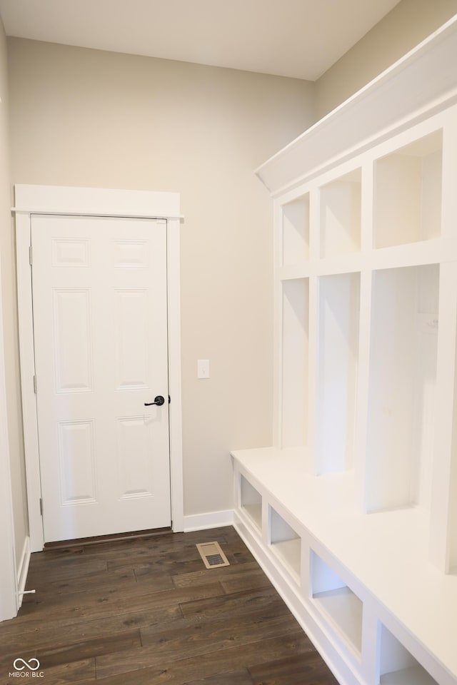 13044 Moorland Ln, Carmel, IN 46074 - mudroom with dark wood-type flooring and baseboards
