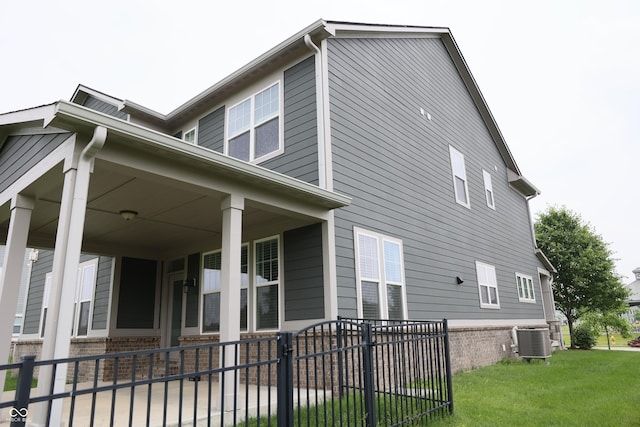 13044 Moorland Ln, Carmel, IN 46074 - view of home's exterior featuring a cooling unit and covered porch