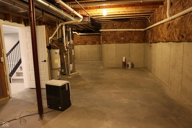 13044 Moorland Ln, Carmel, IN 46074 - unfinished basement with water heater, stairway, and heating unit