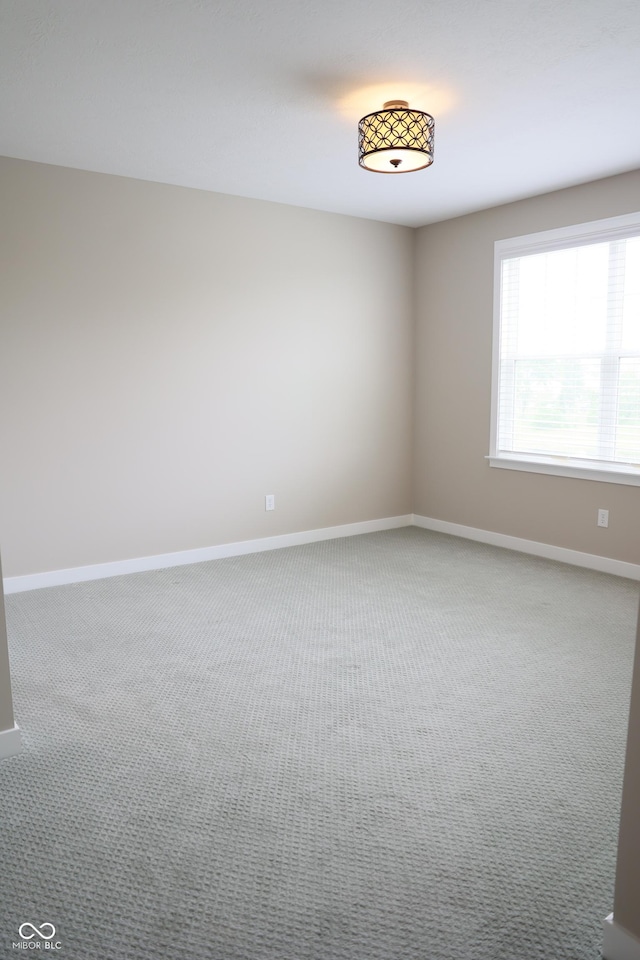13044 Moorland Ln, Carmel, IN 46074 - empty room featuring carpet floors and baseboards