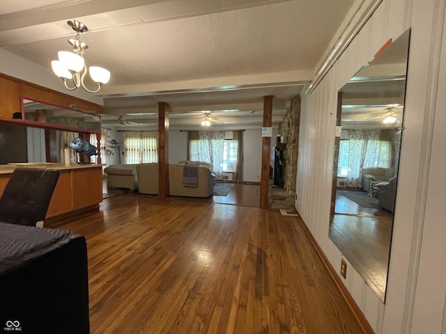 7725 S Oak Dr, Indianapolis, IN 46227 - living area with ceiling fan, wood finished floors, and a chandelier