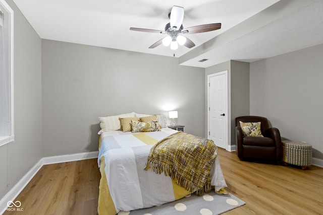 12214 Ridgeside Rd, Indianapolis, IN 46256 - bedroom featuring light wood finished floors and a ceiling fan