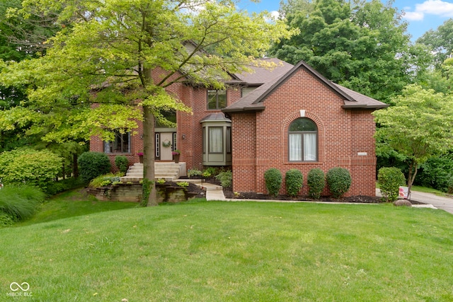 12214 Ridgeside Rd, Indianapolis, IN 46256 - view of front of property featuring a front yard and brick siding