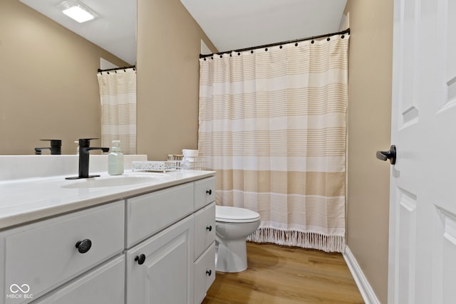 12214 Ridgeside Rd, Indianapolis, IN 46256 - bathroom featuring vanity, wood finished floors, and curtained shower