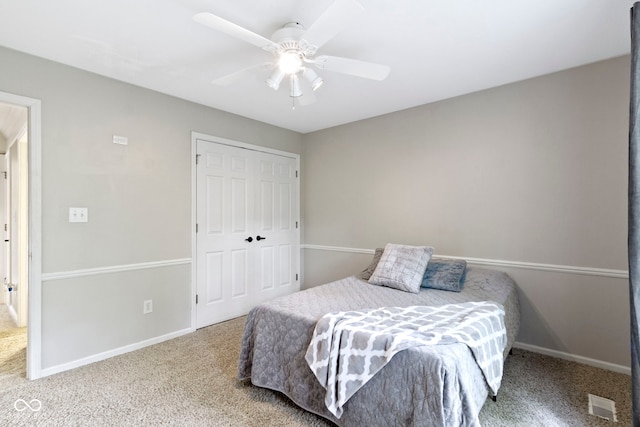 12214 Ridgeside Rd, Indianapolis, IN 46256 - bedroom with carpet, a closet, and a ceiling fan