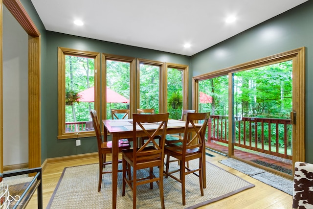 12214 Ridgeside Rd, Indianapolis, IN 46256 - dining space with light wood-type flooring and recessed lighting