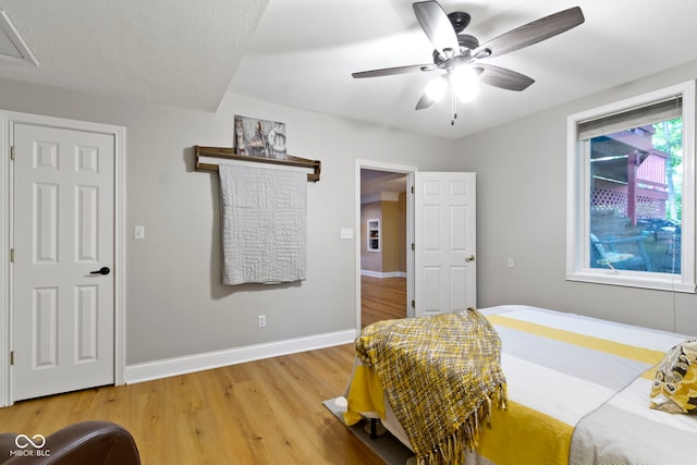 12214 Ridgeside Rd, Indianapolis, IN 46256 - bedroom featuring light wood-style floors and a ceiling fan