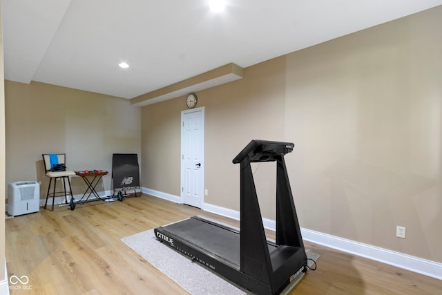 12214 Ridgeside Rd, Indianapolis, IN 46256 - exercise room with wood finished floors and recessed lighting