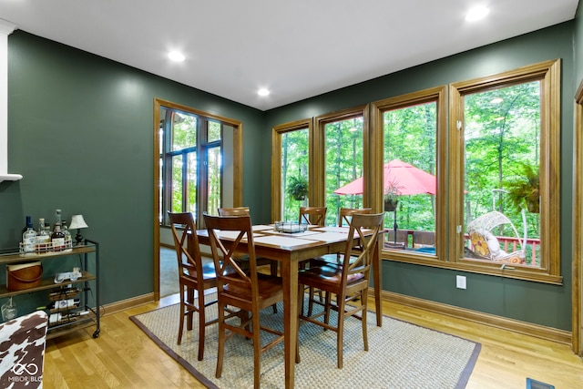 12214 Ridgeside Rd, Indianapolis, IN 46256 - dining area featuring light wood-style flooring and recessed lighting