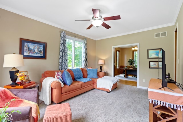 12214 Ridgeside Rd, Indianapolis, IN 46256 - living room featuring crown molding, carpet flooring, and ceiling fan