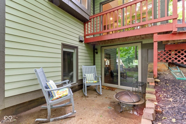 12214 Ridgeside Rd, Indianapolis, IN 46256 - view of patio / terrace featuring a fire pit and a deck