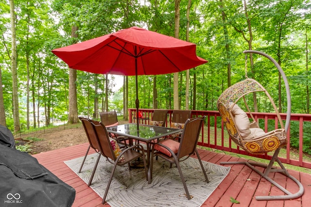 12214 Ridgeside Rd, Indianapolis, IN 46256 - wooden terrace with outdoor dining area