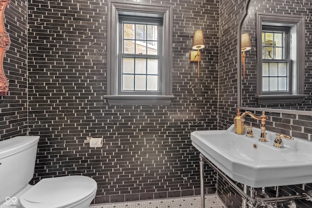 2421 W 39th St, Indianapolis, IN 46228 - bathroom with brick wall