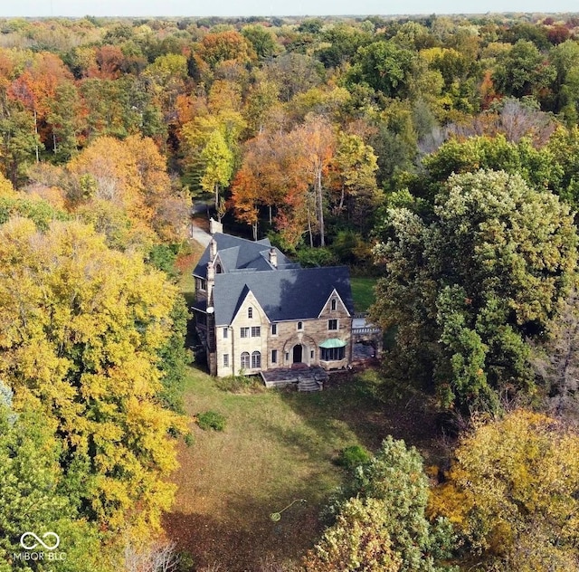 2421 W 39th St, Indianapolis, IN 46228 - aerial view of property and surrounding area with a heavily wooded area